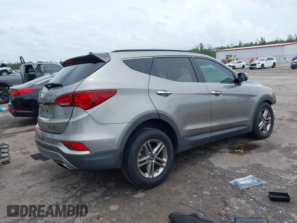 2017 Hyundai Santa Fe 2.4L with VIN 5NMZU3LB2HH014844, listed as a IAAI auction lot 42657624 with 93,533 mi miles and . Bid and sale history available at DreamBid. Image 4.