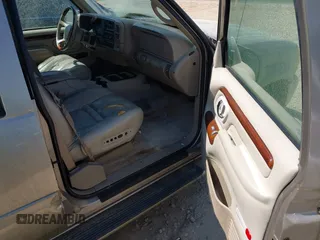 2000 Cadillac Escalade z VIN 1GYEK63R2YR209125, wystawiony jako IAAI lot #41854270 z przebiegiem 198 017 mil mil oraz . Historia ofert i sprzedaży dostępna na DreamBid. Obrazek 5.
