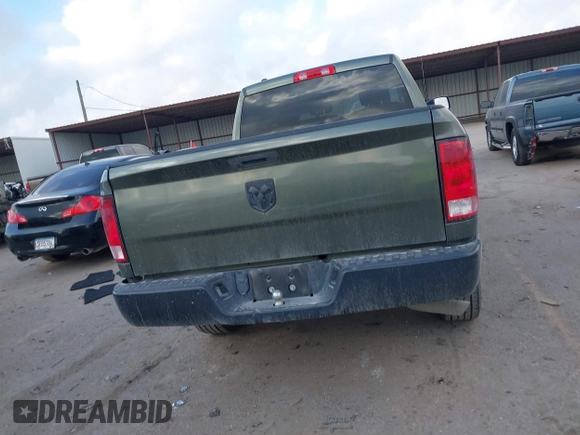 2021 Ram 1500 Tradesman with VIN 1C6RR6FG4MS569116, listed as a IAAI auction lot 41510076 with 80,168 mi miles and . Bid and sale history available at DreamBid. Image 16.