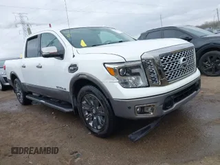 2017 Nissan Titan SV with VIN 1N6AA1E61HN570458, listed as a IAAI auction lot 41772121 with 168,907 mi miles and . Bid and sale history available at DreamBid. Image 1.