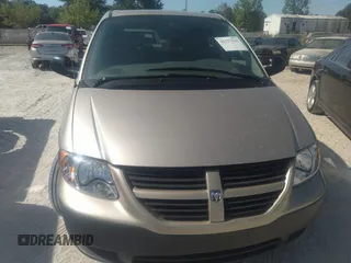 2005 Dodge Caravan SE with VIN 1D4GP25B25B410300, listed as a IAAI auction lot 42117541 with 34,596 mi miles and . Bid and sale history available at DreamBid. Image 6.