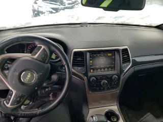 2014 Jeep Grand Cherokee Overland with VIN 1C4RJFCM9EC367863, listed as a Copart auction lot 43227105 with 221,273 mi miles and Salvage Title. Bid and sale history available at carsss.com. Image 8.