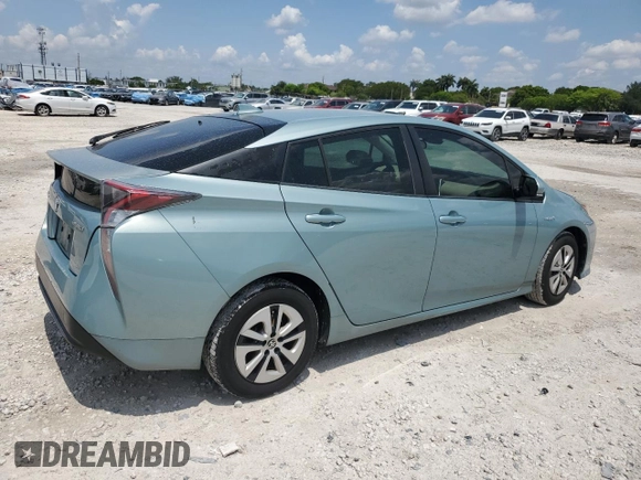 2017 Toyota Prius Two z VIN JTDKARFUXH3040343, wystawiony jako Copart lot #57870425 z przebiegiem 59 711 mil mil oraz Szkoda całkowita • Salvage title. Historia ofert i sprzedaży dostępna na DreamBid. Obrazek 3.