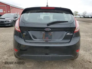 2019 Ford Fiesta SE z VIN 3FADP4EJ8KM124903, wystawiony jako Copart lot #54560125 z przebiegiem 86 616 mil mil oraz Szkoda całkowita • Salvage title. Historia ofert i sprzedaży dostępna na DreamBid. Obrazek 6.