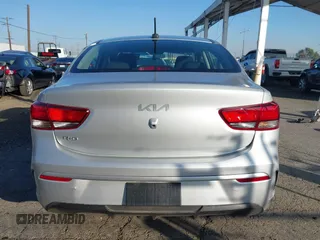 2023 Kia Rio LX with VIN 3KPA24AD1PE599290, listed as a IAAI auction lot 41023283 with 10,027 mi miles and . Bid and sale history available at DreamBid. Image 16.