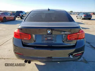 2017 BMW 3 Series 330e iPerformance with VIN WBA8E1C31HA156504, listed as a Copart auction lot 47971015 with 77,396 mi miles and Salvage Title. Bid and sale history available at carsss.com. Image 6.