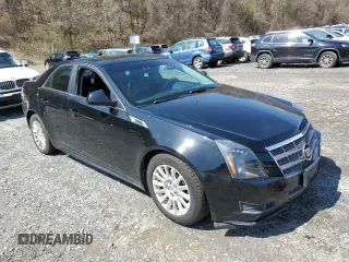 2011 Cadillac CTS Luxury z VIN 1G6DG5EY9B0145097, wystawiony jako Copart lot #52742925 z przebiegiem 133 131 mil mil oraz Czysty tytuł • Clean title. Historia ofert i sprzedaży dostępna na DreamBid. Obrazek 4.