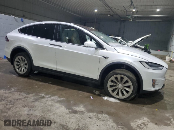 2020 Tesla Model X Long Range with VIN 5YJXCBE26LF228781, listed as a Copart auction lot 46417835 with 46,148 mi miles and Salvage Title. Bid and sale history available at DreamBid. Image 4.