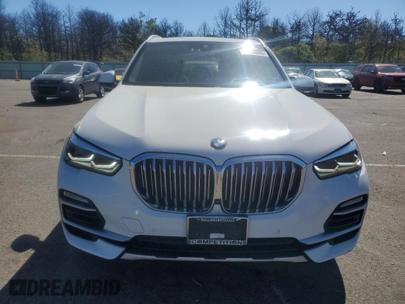 2020 BMW X5 xDrive40i with VIN 5UXCR6C02L9B78012, listed as a Copart auction lot 56568005 with 57,460 mi miles and Salvage title. Bid and sale history available at DreamBid. Image 5.