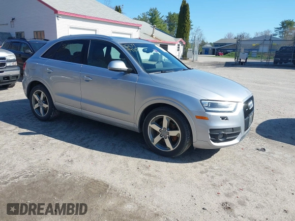 2015 Audi Q3 2.0T Premium Plus with VIN WA1EFCFSXFR010015, listed as a IAAI auction lot 42099410 with 142,117 mi miles. Bid and sale history available at carsss.com. Image 1.