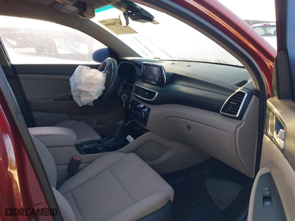 2020 Hyundai Tucson SE with VIN KM8J23A49LU243641, listed as a IAAI auction lot 41794008 with 79,613 mi miles. Bid and sale history available at carsss.com. Image 5.