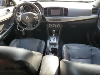 2014 Mitsubishi Lancer SE z VIN JA32V2FW2EU605184, wystawiony jako Copart lot #56007575 z przebiegiem 234 213 mil mil oraz Szkoda całkowita • Salvage title. Historia ofert i sprzedaży dostępna na DreamBid. Obrazek 8.