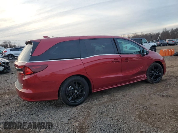 2024 Honda Odyssey Sport with VIN 5FNRL6H74RB070621, listed as a Copart auction lot 82779044 with 1,025 mi miles and Salvage Title. Bid and sale history available at DreamBid. Image 3.