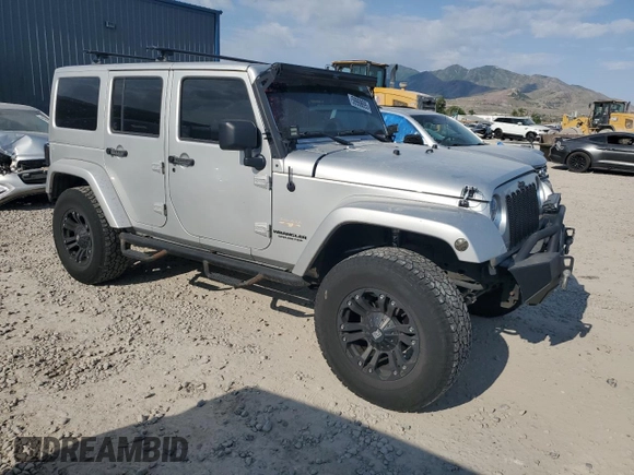 2012 Jeep Wrangler Unlimited Sahara z VIN 1C4HJWEG4CL159731, wystawiony jako Copart lot #59968695 z przebiegiem 111 918 mil mil oraz Szkoda całkowita • Salvage title. Historia ofert i sprzedaży dostępna na DreamBid. Obrazek 4.