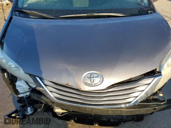 2011 Toyota Sienna XLE AAS with VIN 5TDYK3DC1BS170855, listed as a Copart auction lot 86829904 with 142,117 mi miles and Salvage Title. Bid and sale history available at carsss.com. Image 12.