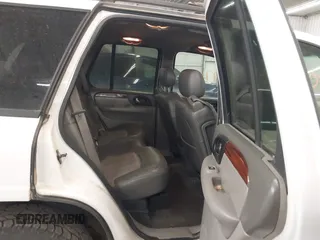 2003 GMC Envoy SLT with VIN 1GKDT13S332222847, listed as a IAAI auction lot 41771052 with 203,699 mi miles. Bid and sale history available at carsss.com. Image 8.