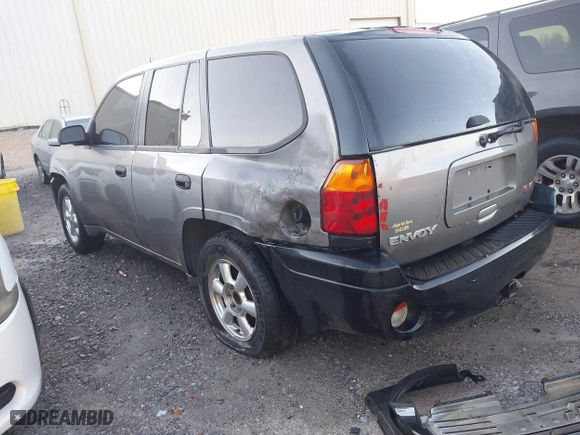 2005 GMC Envoy SLE with VIN 1GKDS13S352215032, listed as a IAAI auction lot 41221612 with 260,647 mi miles. Bid and sale history available at carsss.com. Image 3.