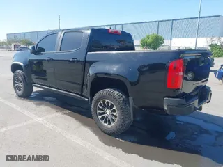 2021 Chevrolet Colorado 4WD ZR2 with VIN 1GCGTEEN6M1169379, listed as a IAAI auction lot 42093827 with 34,489 mi miles. Bid and sale history available at carsss.com. Image 3.