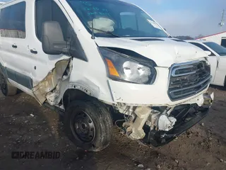 2015 Ford Transit Cargo with VIN 1FTNR1ZMXFKA38419, listed as a IAAI auction lot 41216802 with 109,744 mi miles and . Bid and sale history available at DreamBid. Image 6.