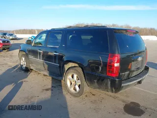2010 Chevrolet Suburban LTZ with VIN 1GNUKKE3XAR142743, listed as a IAAI auction lot 41413380 with 236,384 mi miles. Bid and sale history available at carsss.com. Image 3.