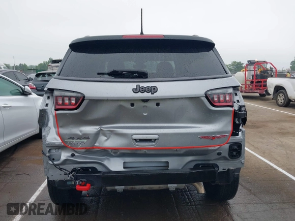 2019 Jeep Compass Trailhawk z VIN 3C4NJDDB9KT721767, wystawiony jako IAAI lot #42115252 z przebiegiem 78 607 mil mil oraz . Historia ofert i sprzedaży dostępna na DreamBid. Obrazek 17.