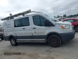 2015 Ford Transit Cargo with VIN 1FTNR1ZM6FKA34609, listed as a IAAI auction lot 42635875 with 214,750 mi miles and . Bid and sale history available at DreamBid. Image 13.