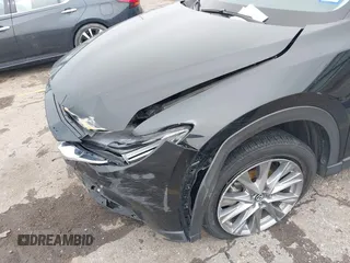 2020 Mazda CX-5 Grand Touring with VIN JM3KFADM8L0811910, listed as a IAAI auction lot 41446214 with 57,849 mi miles. Bid and sale history available at carsss.com. Image 6.