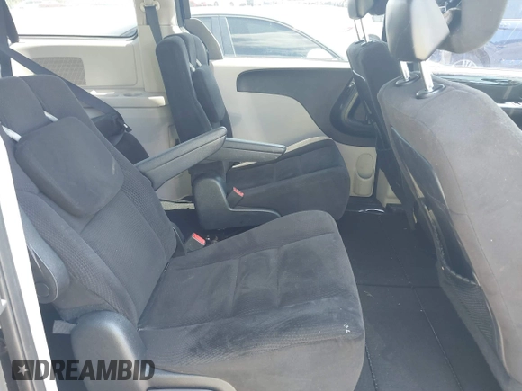 2014 Dodge Grand Caravan SXT with VIN 2C4RDGCG3ER266199, listed as a IAAI auction lot 42119064 with 148,067 mi miles and . Bid and sale history available at DreamBid. Image 8.