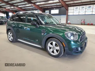 2018 MINI Countryman Cooper with VIN WMZYV5C38J3E03914, listed as a Copart auction lot 87455344 with 86,706 mi miles and Salvage Title. Bid and sale history available at carsss.com. Image 4.