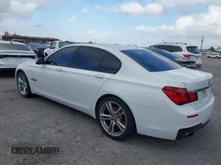 2014 BMW 7 Series 740i with VIN WBAYA6C53ED144195, listed as a IAAI auction lot 41720500 with 123,776 mi miles and . Bid and sale history available at DreamBid. Image 3.