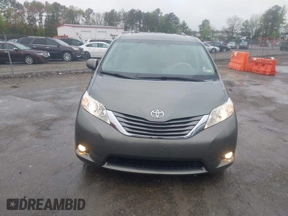 2013 Toyota Sienna XLE AAS with VIN 5TDYK3DC8DS401561, listed as a IAAI auction lot 41990044 with 214,111 mi miles and . Bid and sale history available at DreamBid. Image 12.