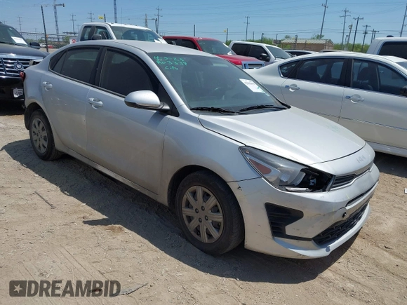 2023 Kia Rio S z VIN 3KPA24AD6PE600384, wystawiony jako IAAI lot #42003099 z przebiegiem 27 001 mil mil oraz . Historia ofert i sprzedaży dostępna na DreamBid. Obrazek 1.