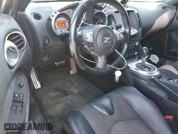 2016 Nissan 370Z Touring z VIN JN1AZ4FH2GM910754, wystawiony jako Copart lot #47288854 z przebiegiem 116 037 mil mil oraz Szkoda całkowita • Salvage title. Historia ofert i sprzedaży dostępna na DreamBid. Obrazek 8.