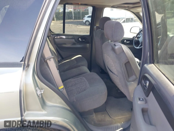 2004 GMC Envoy SLE with VIN 1GKDT13S942254932, listed as a IAAI auction lot 41509407 with 213,068 mi miles. Bid and sale history available at carsss.com. Image 8.