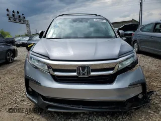 2022 Honda Pilot Touring 7-Passenger with VIN 5FNYF6H69NB019572, listed as a Copart auction lot 55446895 with 82,424 mi miles and Salvage title. Bid and sale history available at DreamBid. Image 5.
