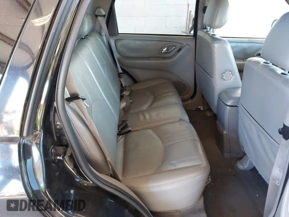 2002 Mazda Tribute LX with VIN 4F2CU08172KM58561, listed as a IAAI auction lot 41435407 with 141,908 mi miles and . Bid and sale history available at carsss.com. Image 8.