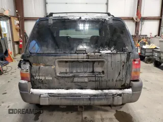 1998 Jeep Grand Cherokee Laredo with VIN 1J4GZ58Y9WC122076, listed as a Copart auction lot 84221784 with 387,353 mi miles and Salvage Title. Bid and sale history available at carsss.com. Image 6.