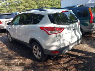 2013 Ford Escape SE with VIN 1FMCU0GX4DUC68046, listed as a IAAI auction lot 42839369 with 185,429 mi miles and . Bid and sale history available at DreamBid. Image 3.