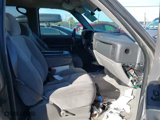 2003 Chevrolet Tahoe LS with VIN 1GNEC13V13J163837, listed as a IAAI auction lot 41641915 with 102,312 mi miles. Bid and sale history available at carsss.com. Image 5.