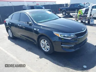 2018 Kia Optima S with VIN 5XXGT4L36JG221671, listed as a IAAI auction lot 41704040 with 136,815 mi miles. Bid and sale history available at carsss.com. Image 1.