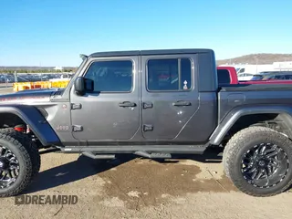 2020 Jeep Gladiator Rubicon with VIN 1C6JJTBG5LL179188, listed as a IAAI auction lot 41316367 with 136,670 mi miles and . Bid and sale history available at DreamBid. Image 14.