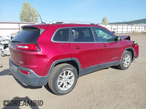 2016 Jeep Cherokee Latitude with VIN 1C4PJMCS8GW250318, listed as a IAAI auction lot 42126241 with 105,028 mi miles. Bid and sale history available at carsss.com. Image 4.