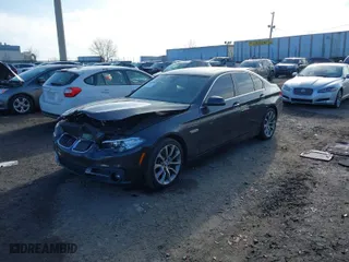 2015 BMW 5 Series 528i xDrive with VIN WBA5A7C55FG142666, listed as a IAAI auction lot 41183686 with 118,325 mi miles. Bid and sale history available at carsss.com. Image 2.
