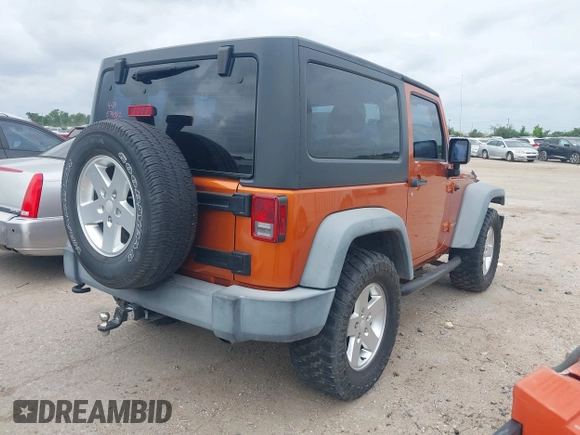 2011 Jeep Wrangler Sport with VIN 1J4AA2D1XBL579882, listed as a IAAI auction lot 42122353 with 153,885 mi miles and . Bid and sale history available at carsss.com. Image 4.