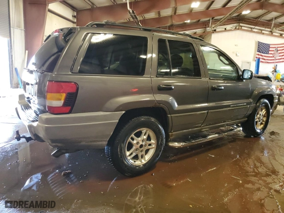 2002 Jeep Grand Cherokee Laredo with VIN 1J4GW48N52C240077, listed as a Copart auction lot 55919394 with 223,991 mi miles and Clean Title. Bid and sale history available at carsss.com. Image 3.