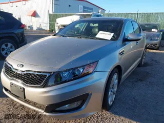 2013 Kia Optima SX w/Limited Pkg with VIN 5XXGR4A63DG124072, listed as a IAAI auction lot 40998791 with 144,696 mi miles. Bid and sale history available at carsss.com. Image 2.