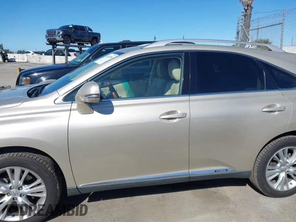 2011 Lexus RX 450h with VIN JTJBC1BAXB2420753, listed as a IAAI auction lot 41823358 with 102,714 mi miles and . Bid and sale history available at DreamBid. Image 14.