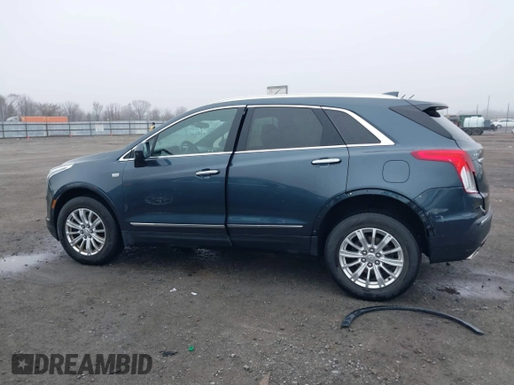 2019 Cadillac XT5 FWD with VIN 1GYKNARS5KZ220134, listed as a IAAI auction lot 41472927 with 58,229 mi miles and . Bid and sale history available at DreamBid. Image 14.