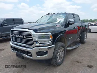 2022 Ram 2500 Laramie with VIN 3C6UR5FJ2NG305658, listed as a IAAI auction lot 42362662 with 50,701 mi miles and . Bid and sale history available at DreamBid. Image 2.