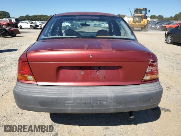 1998 Saturn SL z VIN 1G8ZH528XWZ144301, wystawiony jako Copart lot #75918414 z przebiegiem 219 256 mil mil oraz Szkoda całkowita • Salvage title. Historia ofert i sprzedaży dostępna na DreamBid. Obrazek 6.
